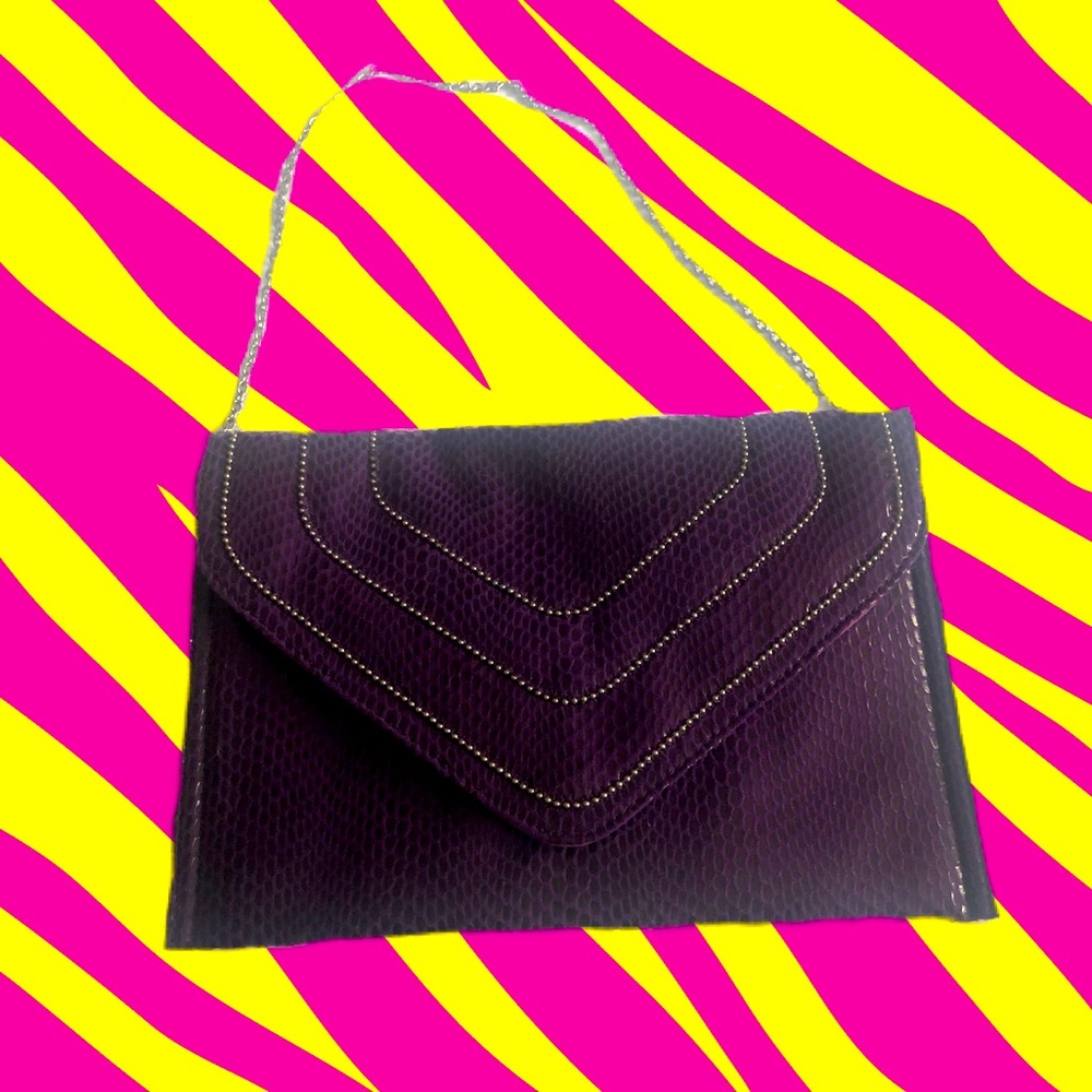 Jennifer Lopez clutch in purple